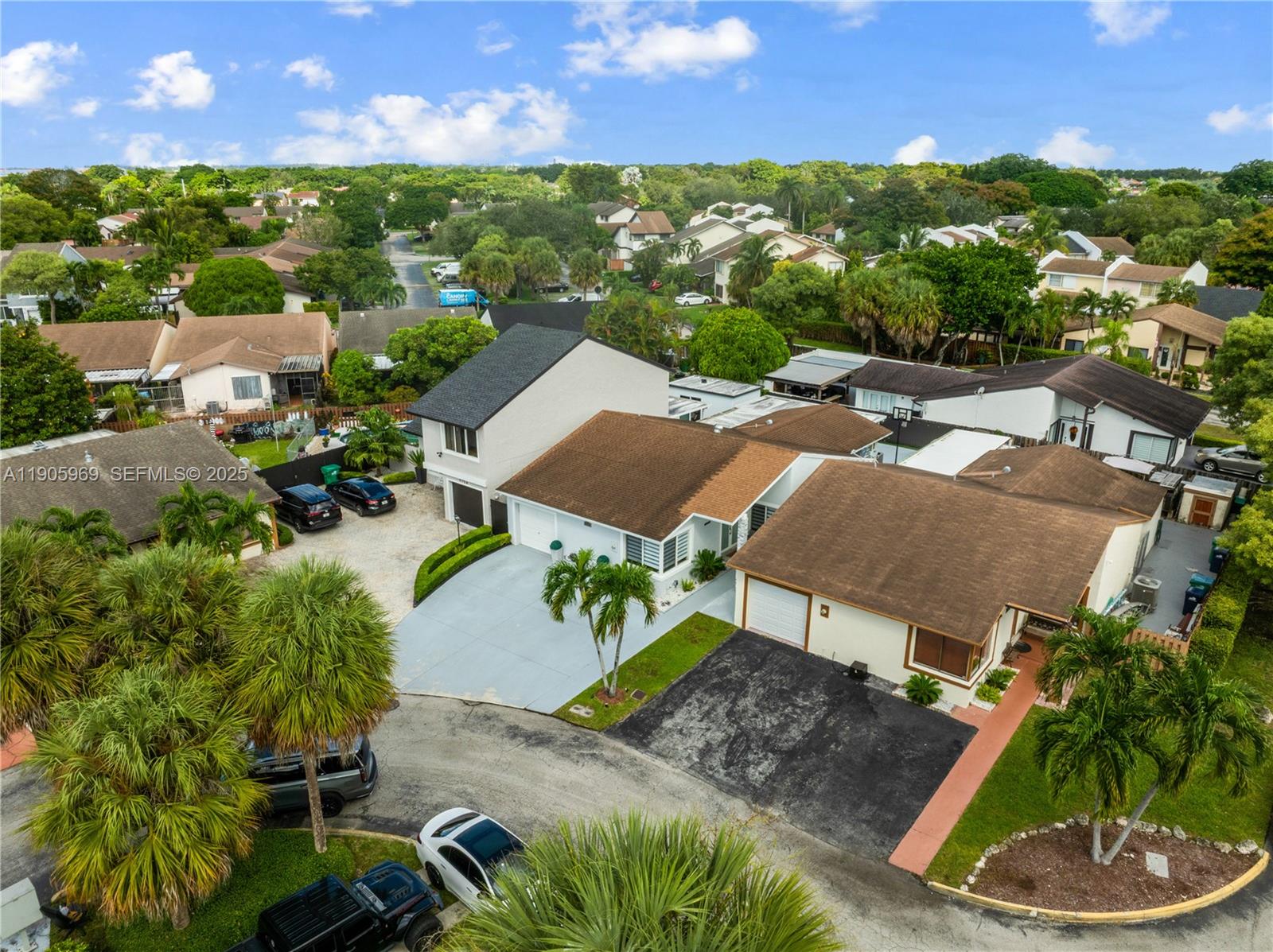 9746 Southwest 147th Court Miami, FL 33196 - Photo 38 of 42 an aerial view of a house with garden space and street view