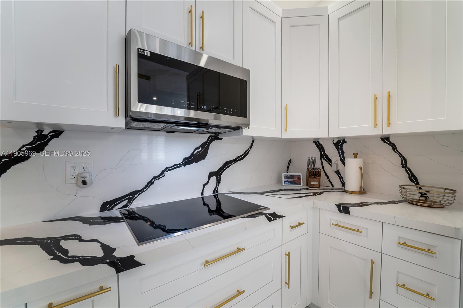 9746 Southwest 147th Court Miami, FL 33196 - Photo 8 of 42 a view of room with workspace and mirror