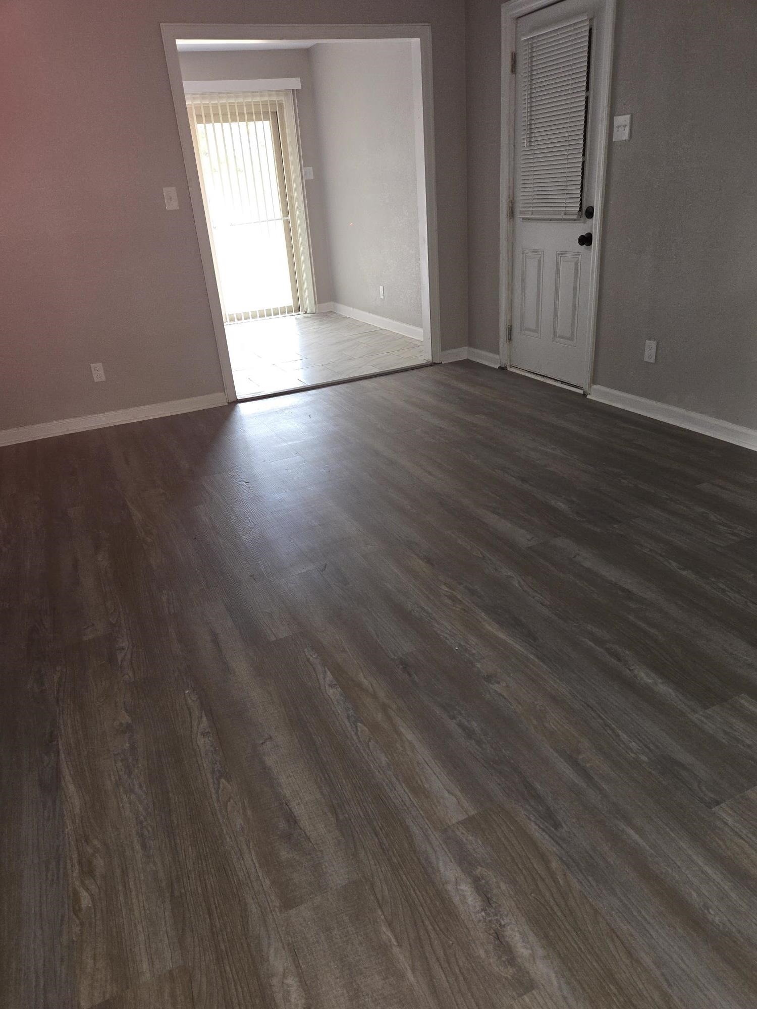 2270 Celeste Drive Memphis, TN 38127 - Photo 3 of 11 Spare room with dark wood-style flooring and baseboards