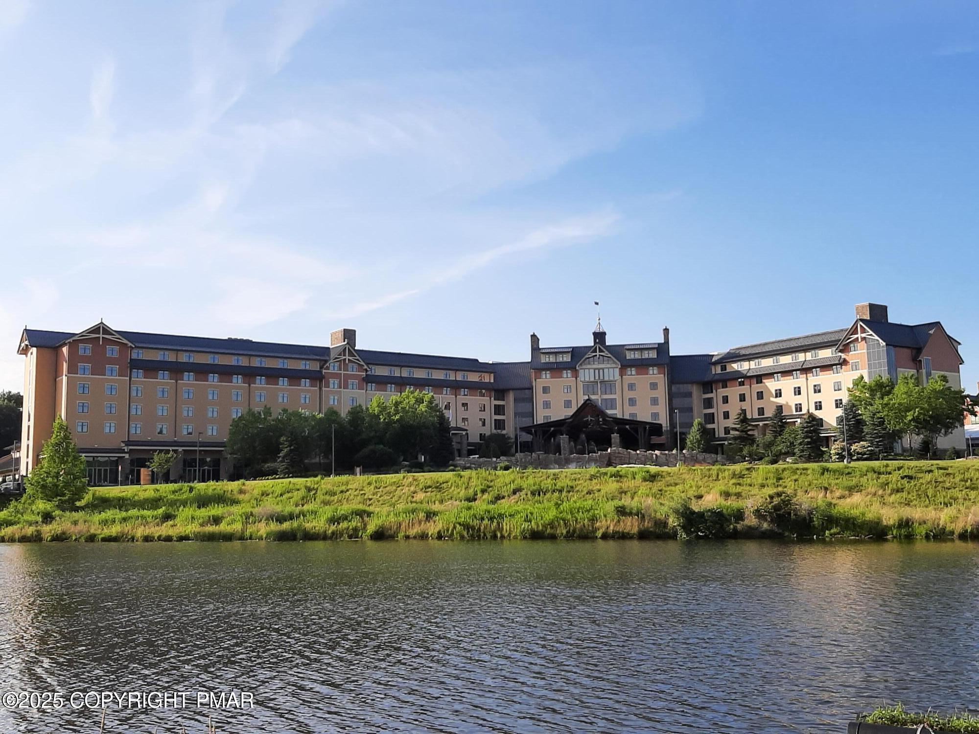 781 White Oak Road Cresco, PA 18326 - Photo 33 of 37 a view of a ocean with a large building in the background