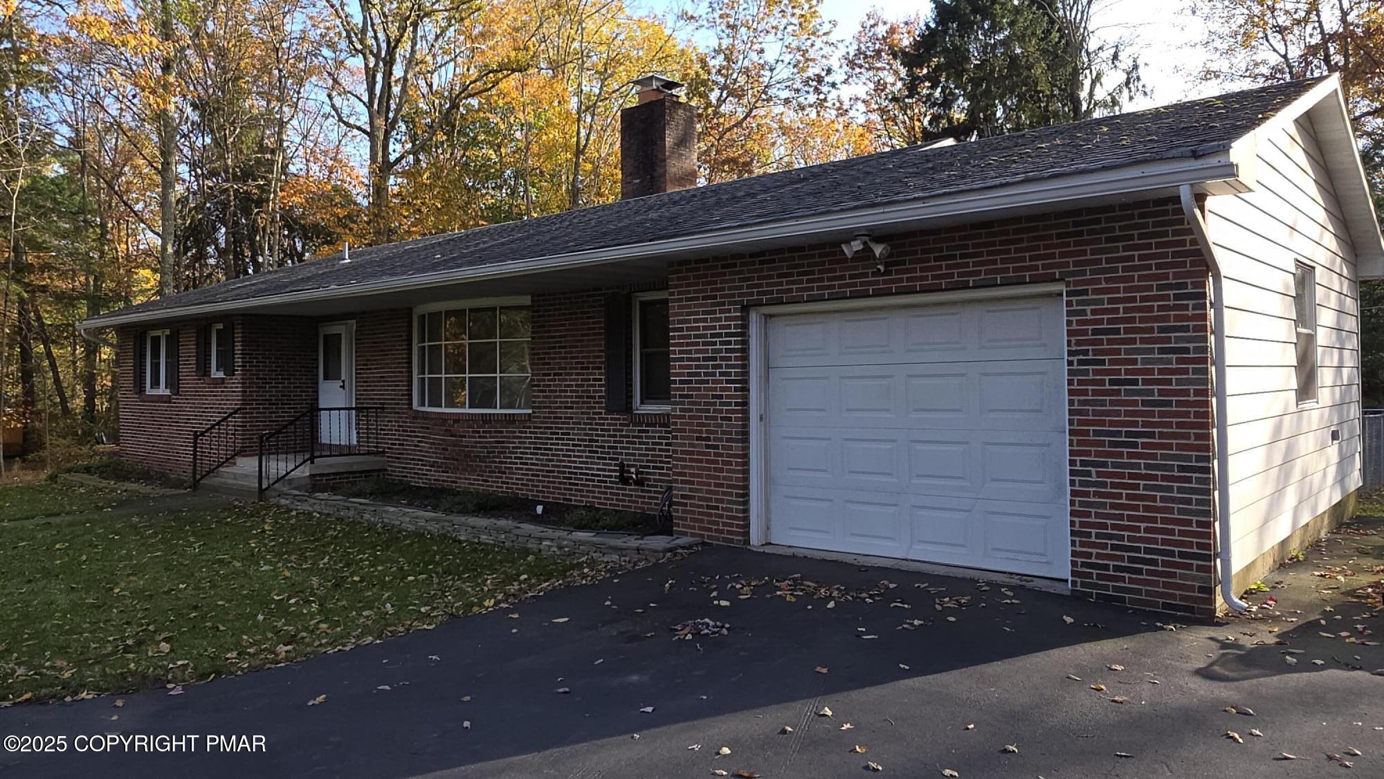 781 White Oak Road Cresco, PA 18326 - Photo 4 of 37 a view of a house with a yard