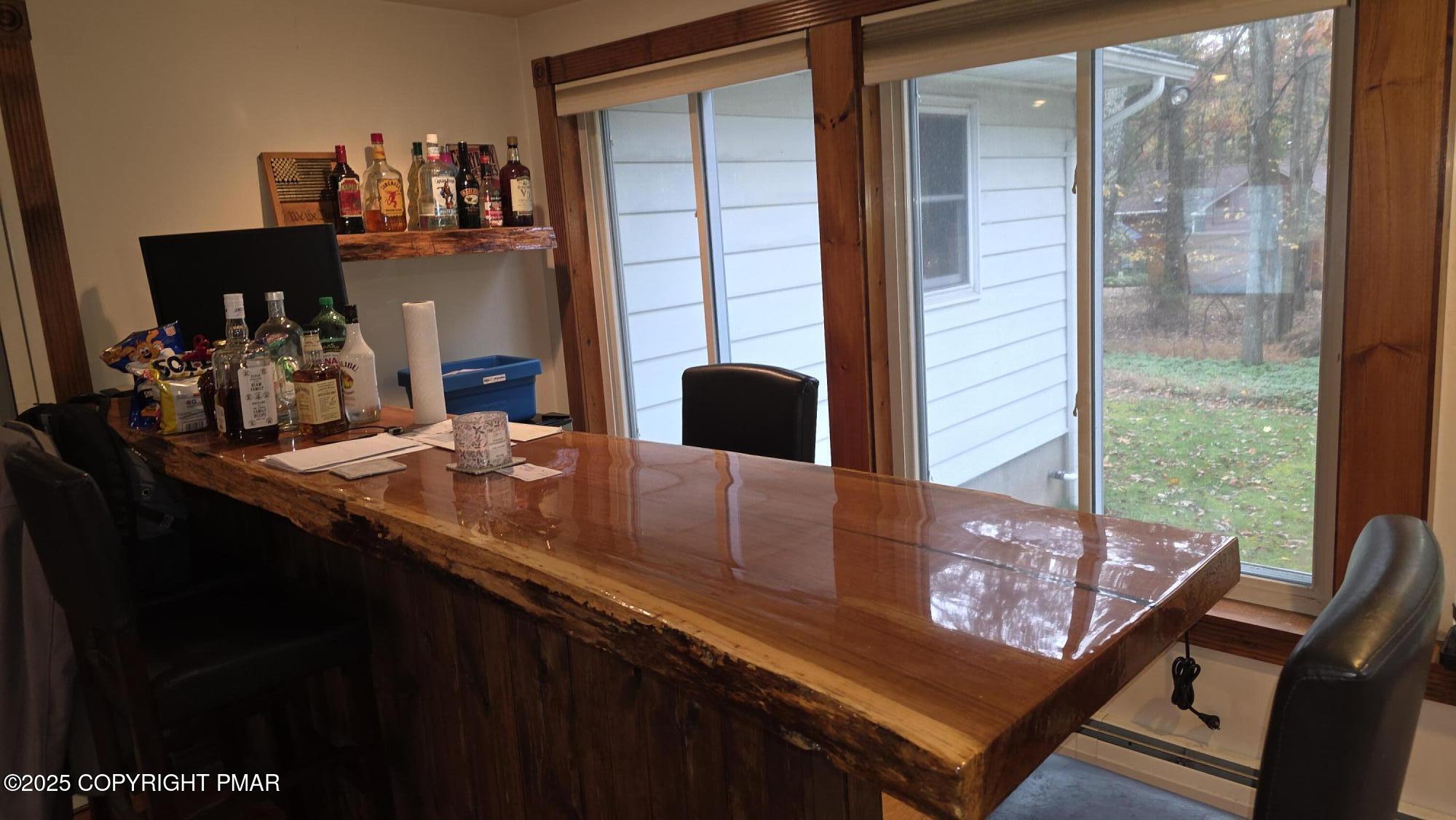 781 White Oak Road Cresco, PA 18326 - Photo 9 of 37 a view of a dining room with furniture and window