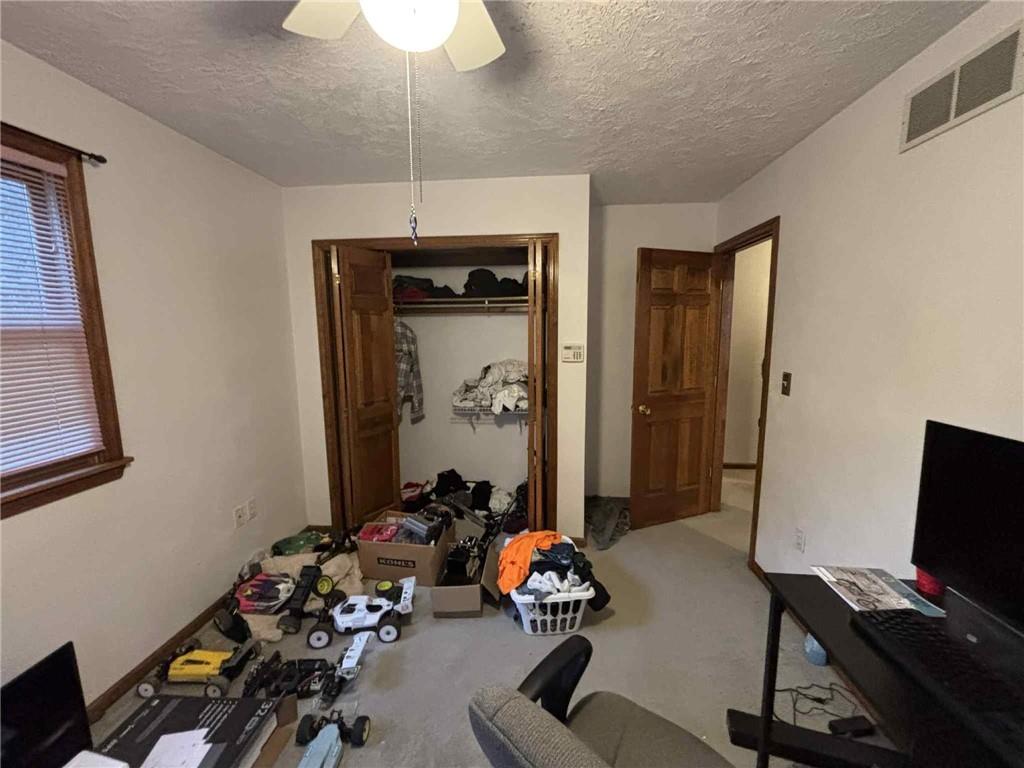 244 Spring Run Road Crescent, PA 15046 - Photo 16 of 17 a room with gym equipment and mirror on the wall