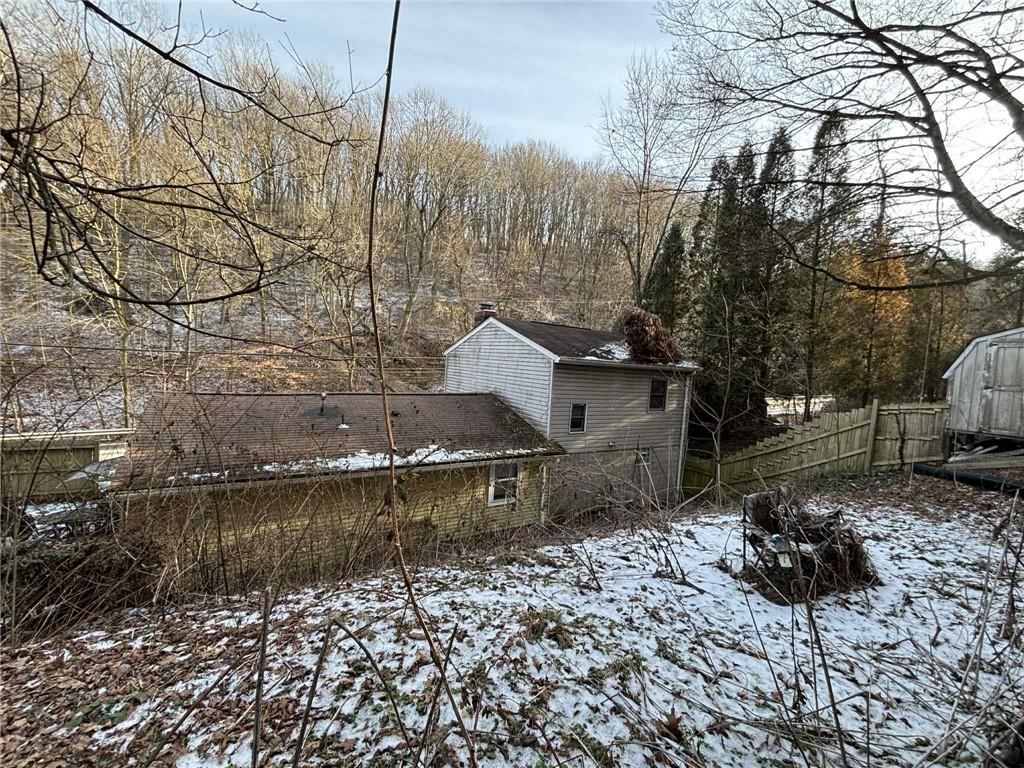 244 Spring Run Road Crescent, PA 15046 - Photo 5 of 17 a backyard of a house with barbeque oven and outdoor seating