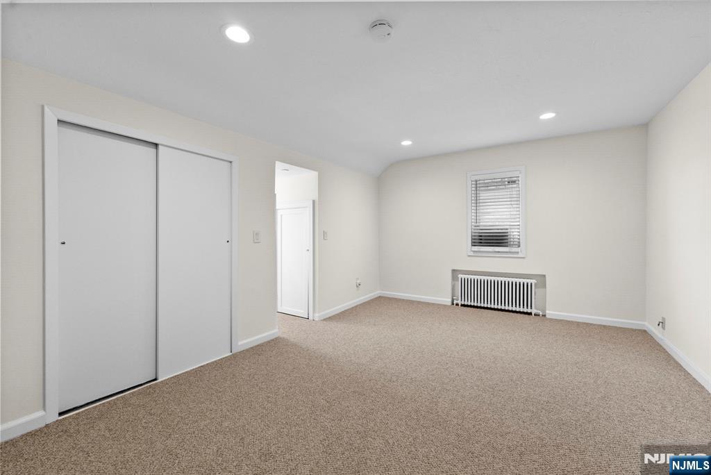 461 9th Street, Unit 2 Fairview, NJ 07022 - Photo 10 of 19 a view of empty room with kitchen