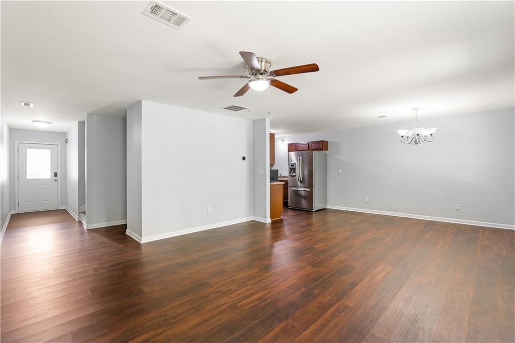 1221 Rockfield Circle Norcross, GA 30093 - Photo 3 of 10 a view of empty room with wooden floor