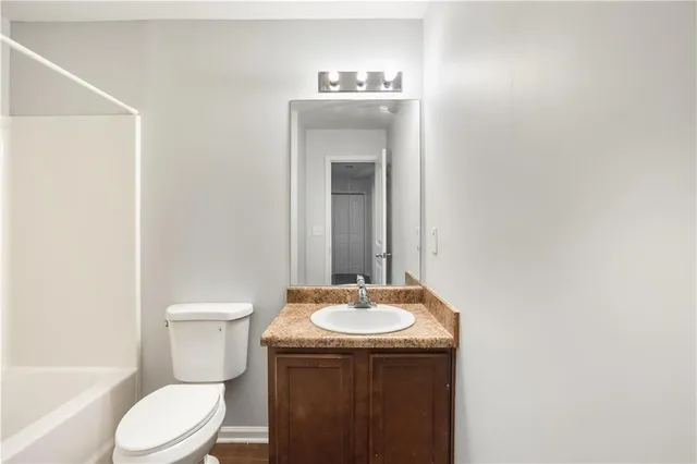 a bathroom with a sink and a toilet