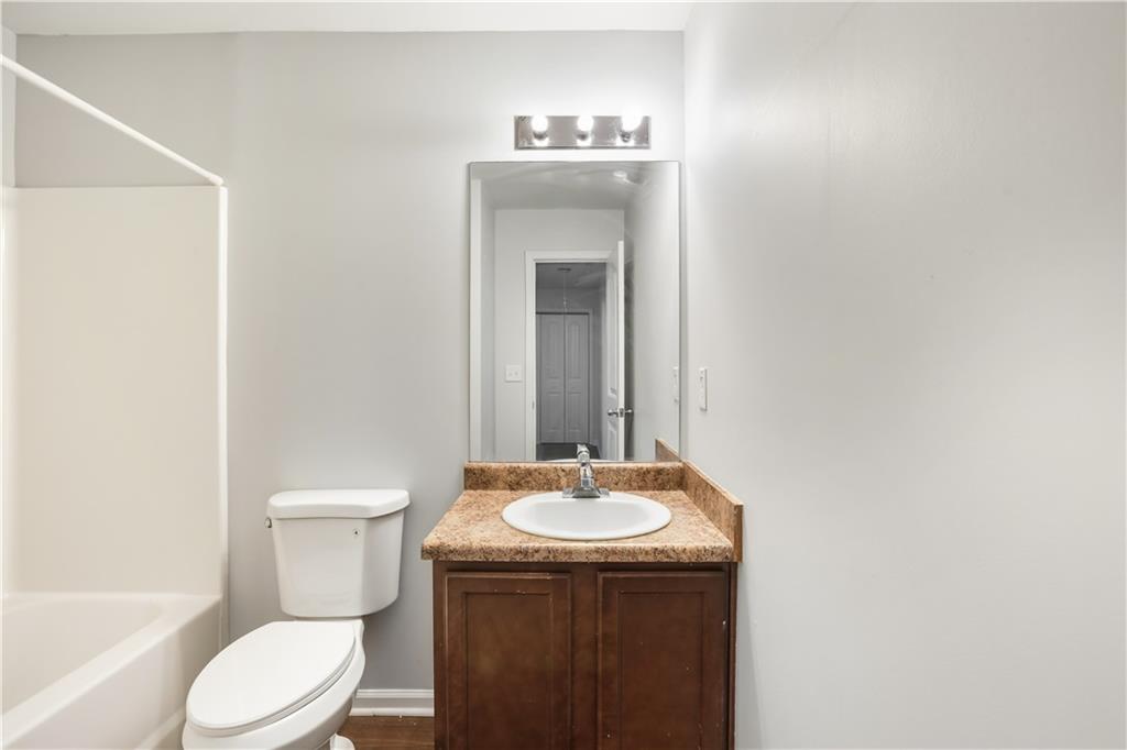 1221 Rockfield Circle Norcross, GA 30093 - Photo 9 of 10 a bathroom with a sink and a toilet