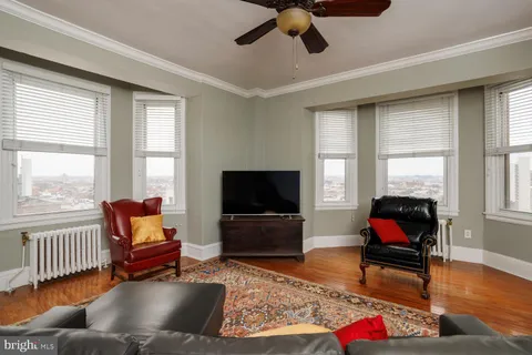 a living room with furniture or couch and a flat screen tv