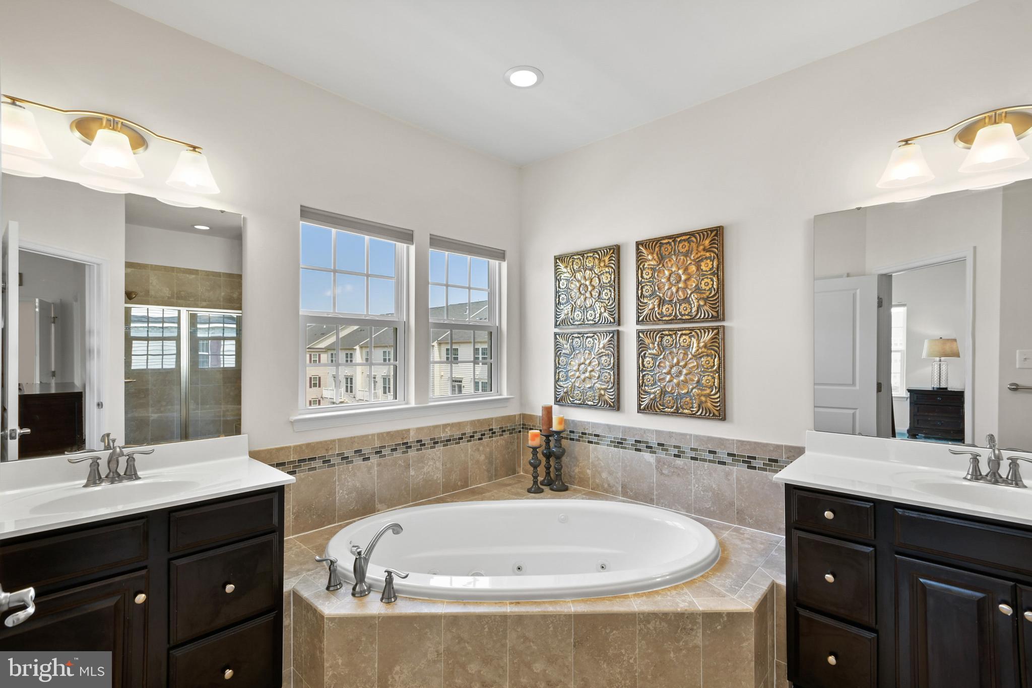 4902 Small Gains Way Frederick, MD 21703 - Photo 18 of 27 Master bath soaking tub and double vanity