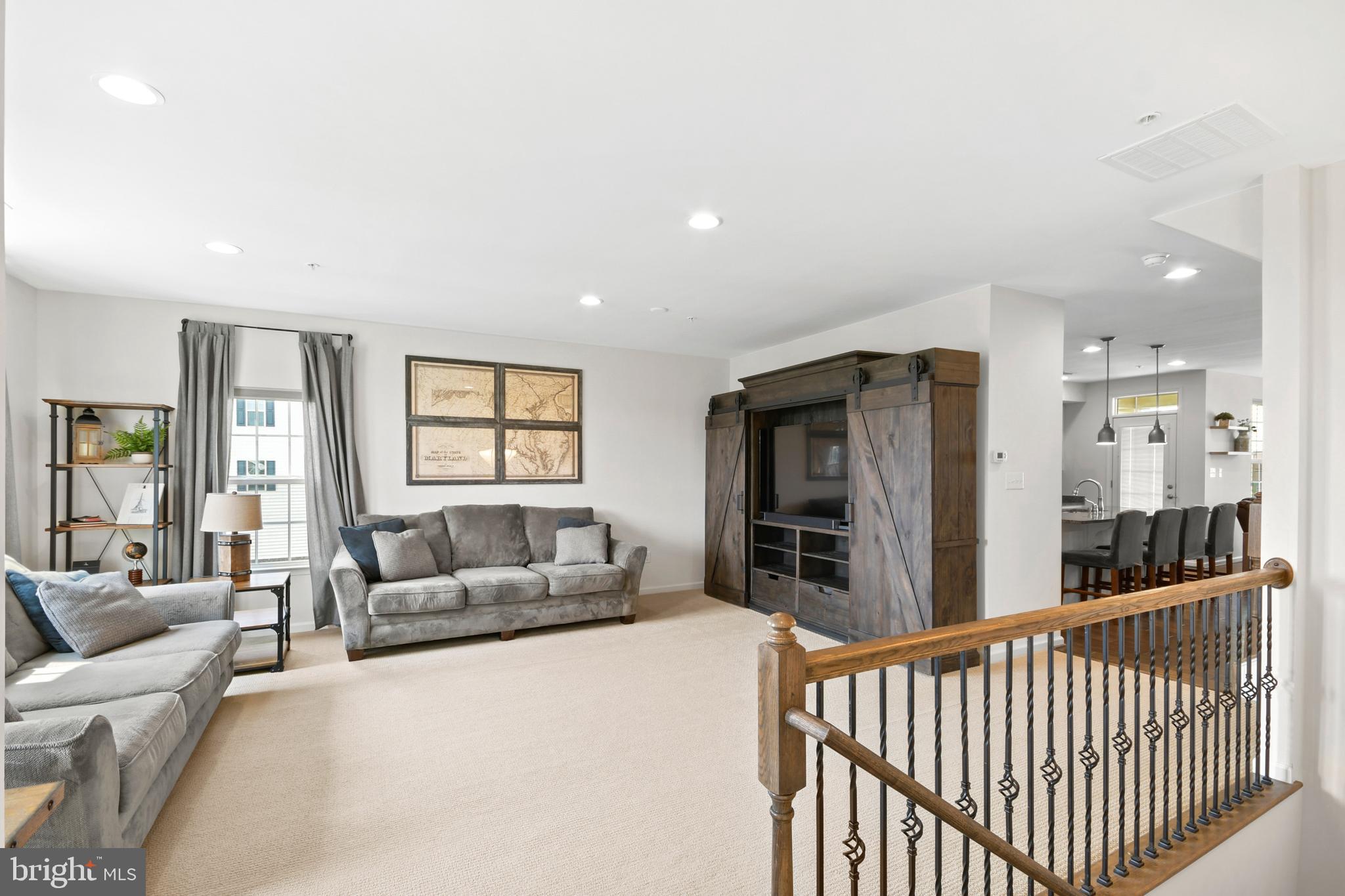 4902 Small Gains Way Frederick, MD 21703 - Photo 2 of 27 Walking up and into the main level living room