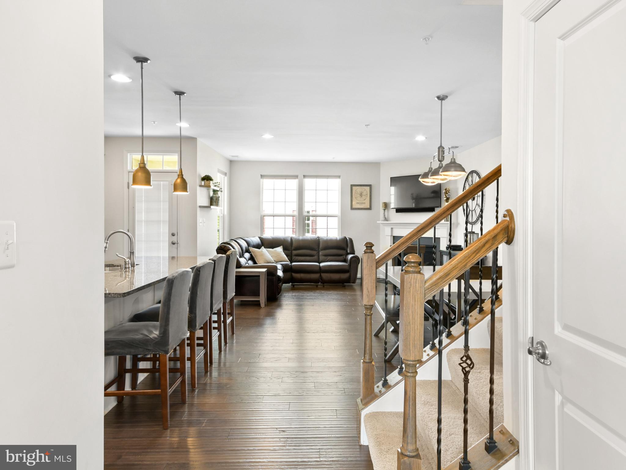 4902 Small Gains Way Frederick, MD 21703 - Photo 7 of 27 Entry to the kitchen and family room