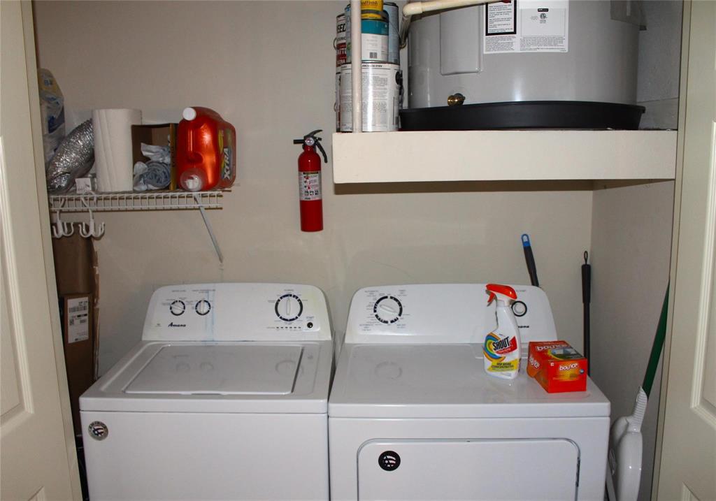 3102 Kings Road, Unit 1207 Dallas, TX 75219 - Photo 17 of 22 a utility room with dryer and washer