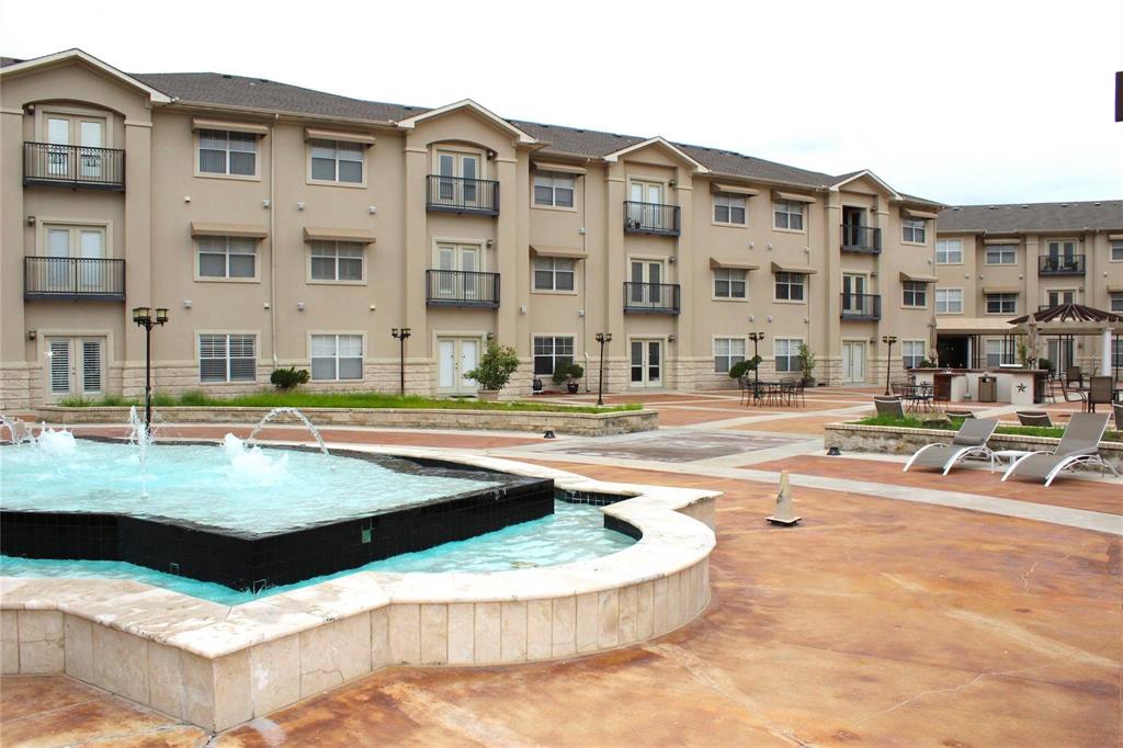 3102 Kings Road, Unit 1207 Dallas, TX 75219 - Photo 21 of 22 a view of building with outdoor space