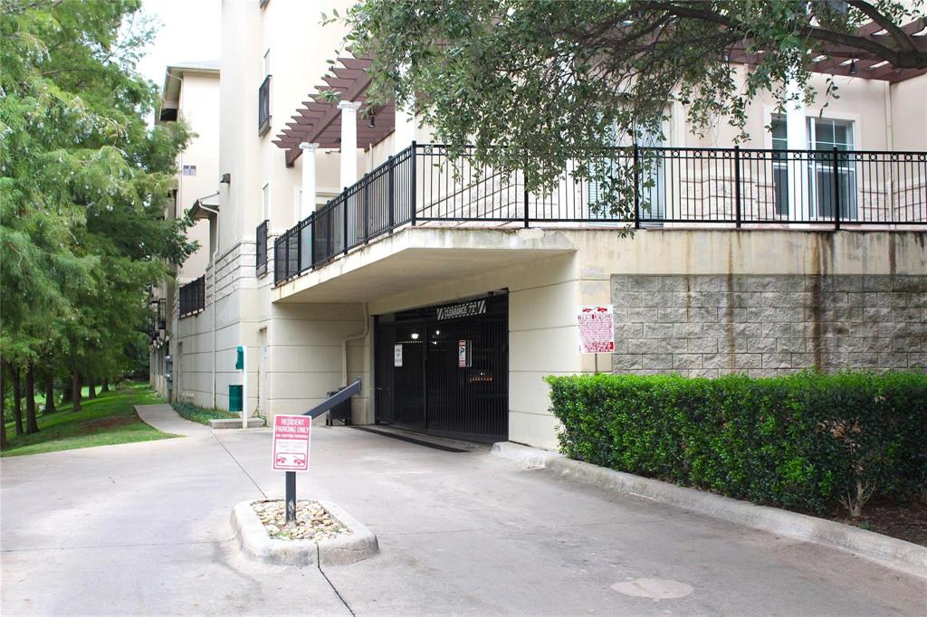 3102 Kings Road, Unit 1207 Dallas, TX 75219 - Photo 22 of 22 a front view of a house with garden