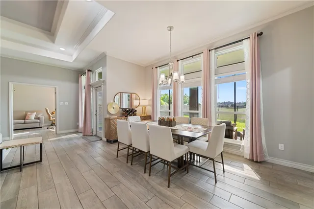 a dining room with furniture window wooden floor