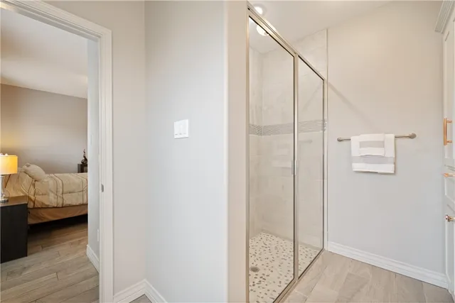 a bedroom with a bed and a closet