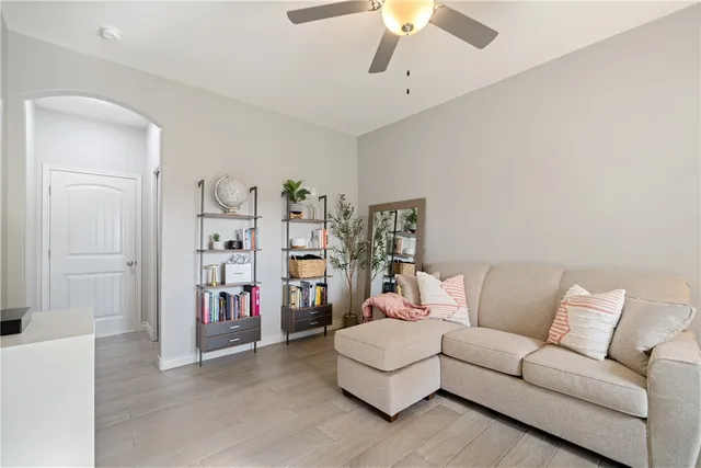 a living room with furniture and a couch