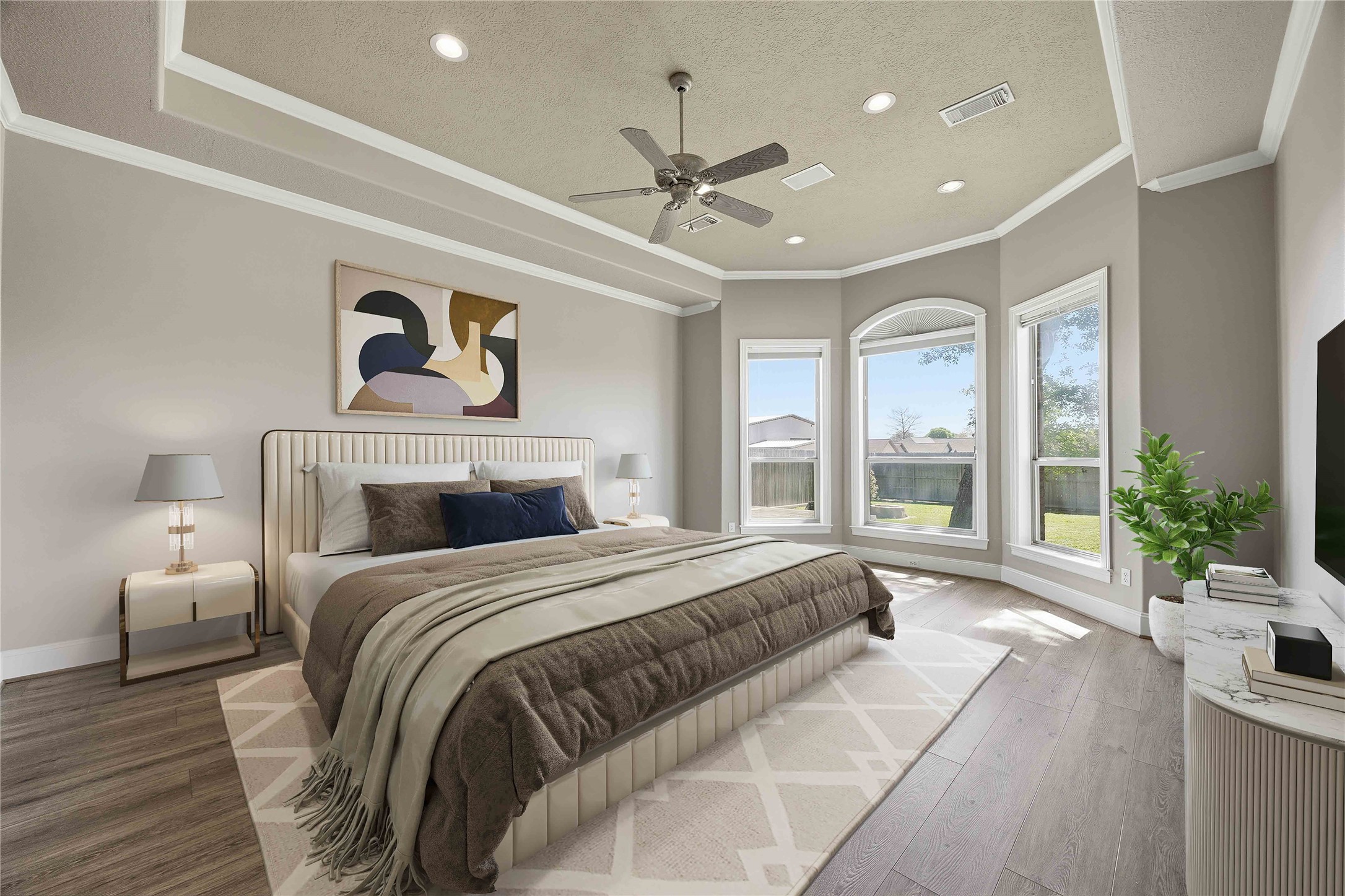 1930 Old River Road Montgomery, TX 77356 - Photo 20 of 49 A spacious primary bedroom features a tray ceiling, a set of windows overlooking the backyard, and plenty of space in which to design your furniture layout. (Virtually Staged)