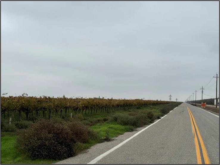 20303 Lincoln Road Chowchilla, CA 93610 - Photo 3 of 14 a view of a river and mountains in the background