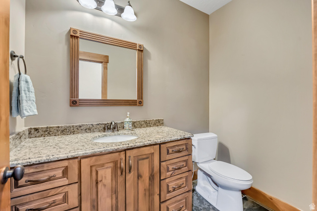 896 West 675 South Mapleton, UT 84664 - Photo 42 of 77 Half bathroom featuring vanity and toilet