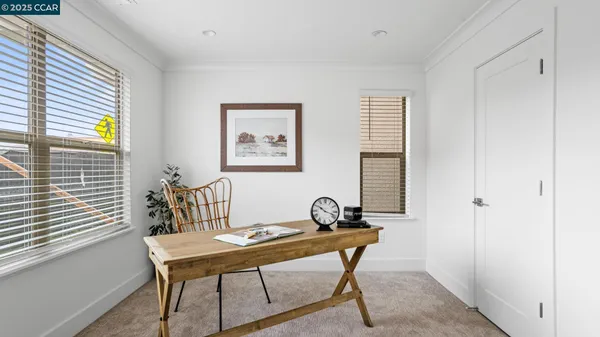 a room with a table and chairs