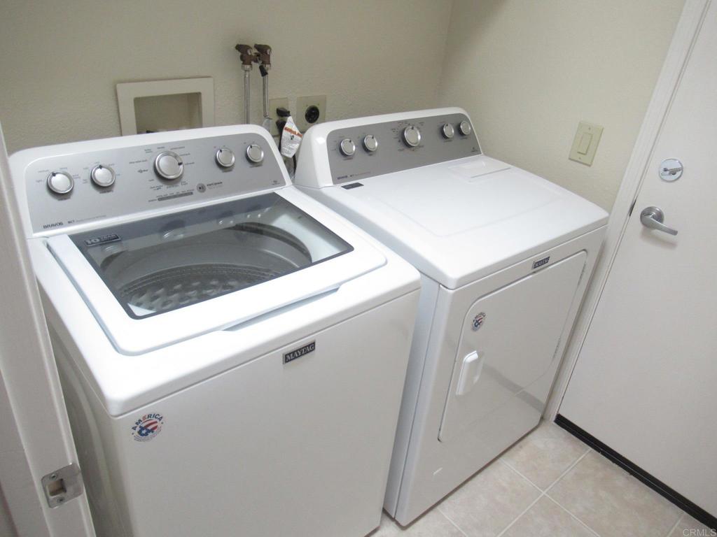 4721 Majorca Way Oceanside, CA 92056 - Photo 11 of 23 a utility room with dryer and washer