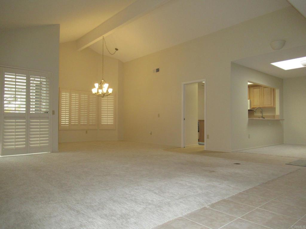 4721 Majorca Way Oceanside, CA 92056 - Photo 7 of 23 a view of an empty room with a bathroom