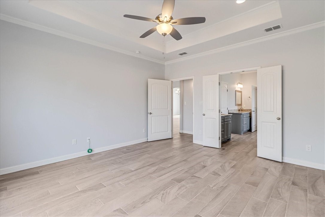 15501 Escapade Street Corpus Christi, TX 78418 - Photo 20 of 40 a view of a kitchen with a sink and a refrigerator