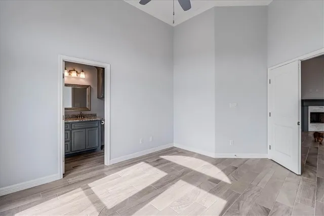 wooden floor in a hall with an empty room