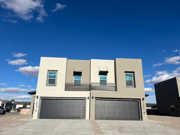 a view of a house with a flat screen tv