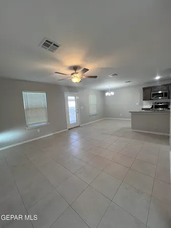 a view of a livingroom and window