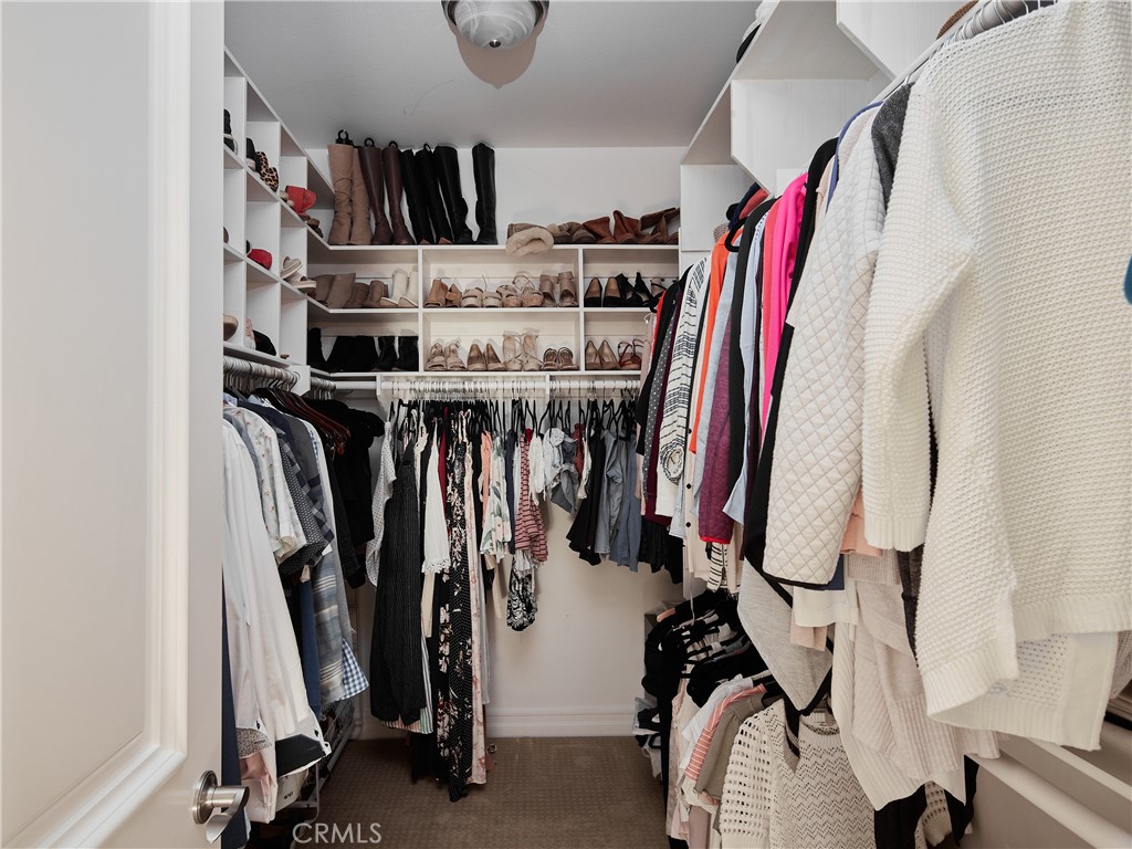 700 West Sycamore Avenue El Segundo, CA 90245 - Photo 29 of 42 a view of walk in closet with clothes and shoes