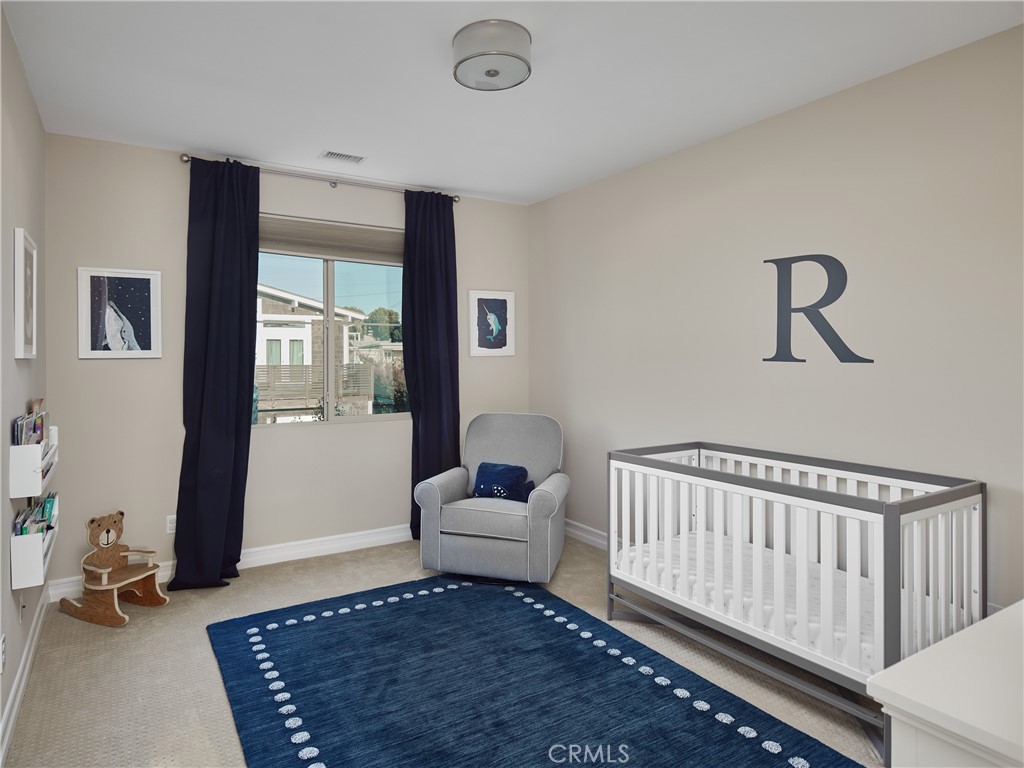 700 West Sycamore Avenue El Segundo, CA 90245 - Photo 36 of 42 a living room with furniture and a rug
