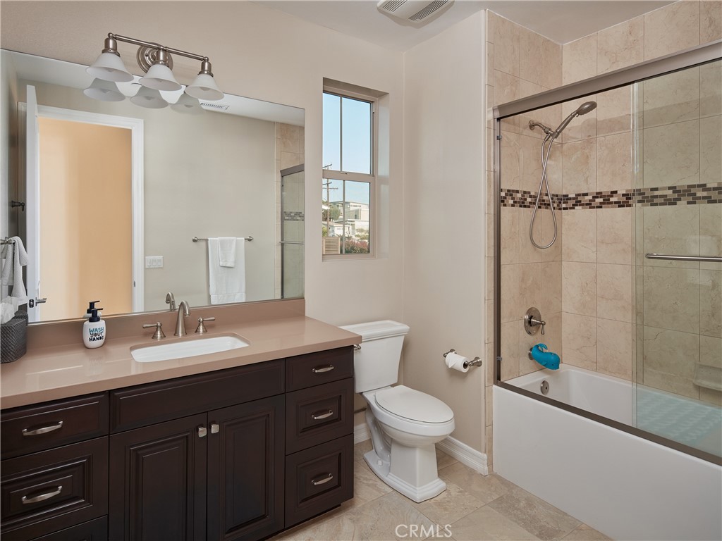 700 West Sycamore Avenue El Segundo, CA 90245 - Photo 37 of 42 a spacious bathroom with a granite countertop sink toilet and shower