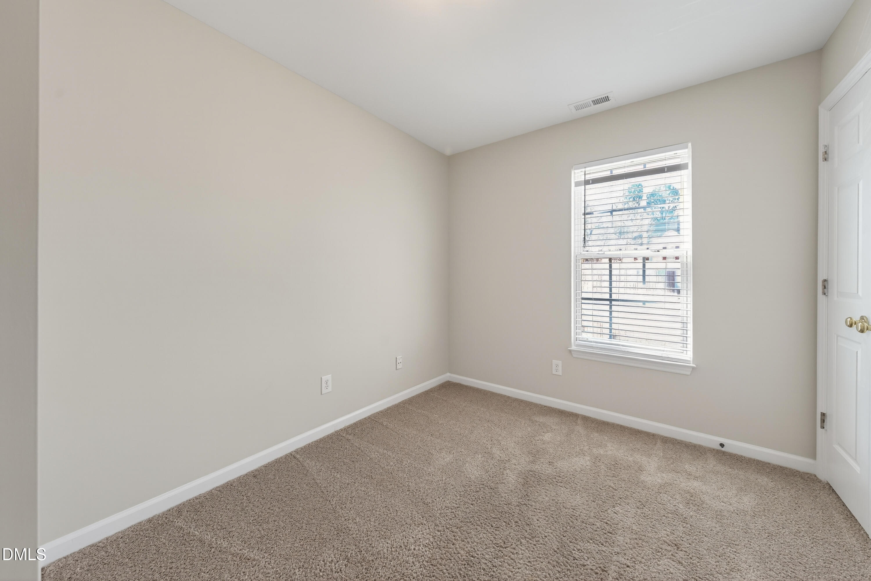 1601 Briarmont Court Raleigh, NC 27610 - Photo 26 of 30 an empty room with a window