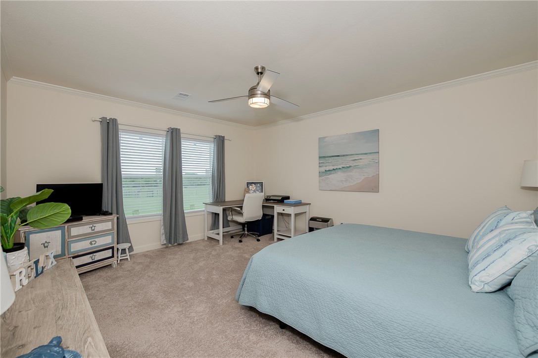 10976 Whiterock Road Bremond, TX 76629 - Photo 16 of 42 a bed room with furniture and a window