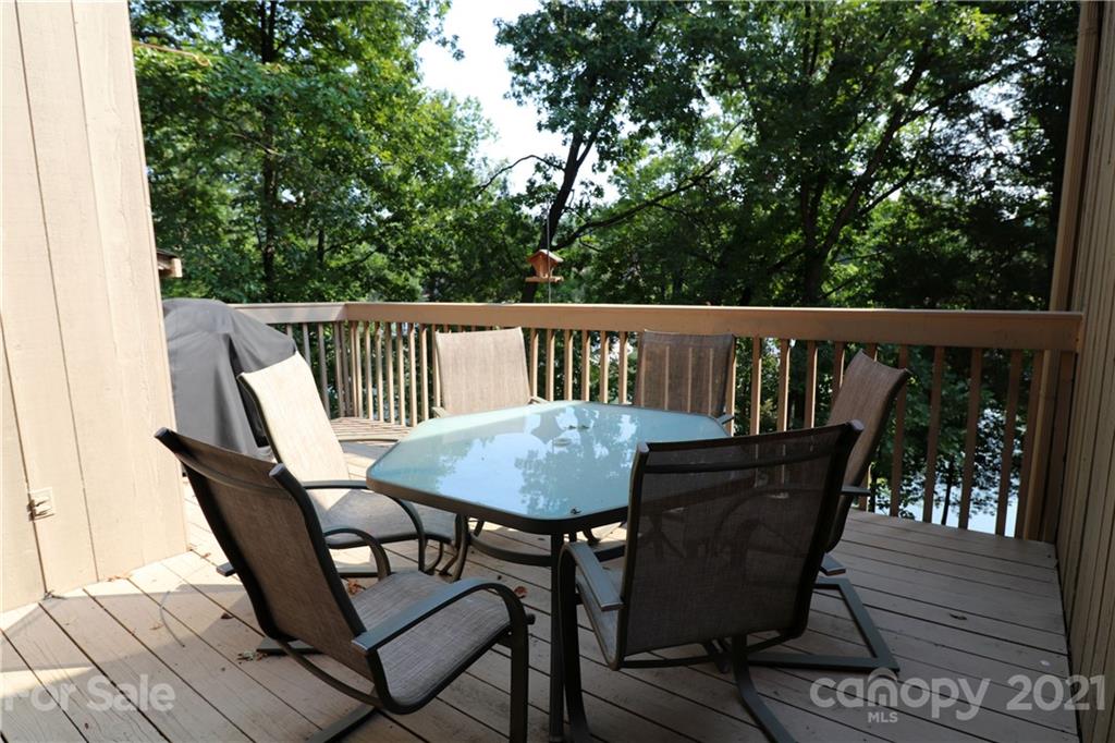 64 Ridgeport Road Lake Wylie, SC 29710 - Photo 11 of 37 a view of a chair and table in the balcony