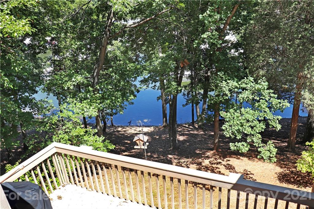 64 Ridgeport Road Lake Wylie, SC 29710 - Photo 22 of 37 a view of a wooden fence and trees