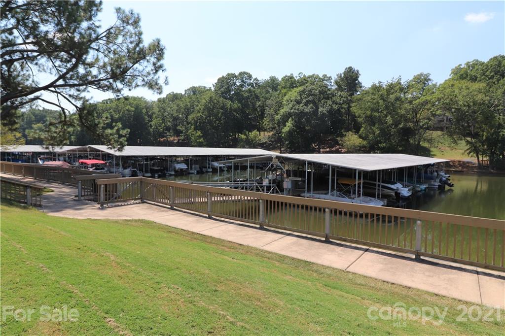 64 Ridgeport Road Lake Wylie, SC 29710 - Photo 36 of 37 a view of a house with pool and a yard