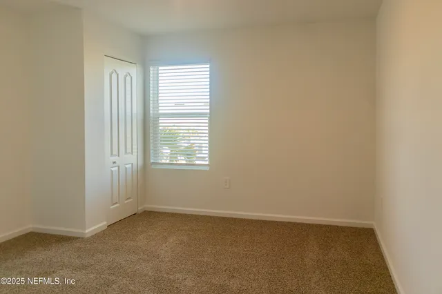 a front view of house with small garden