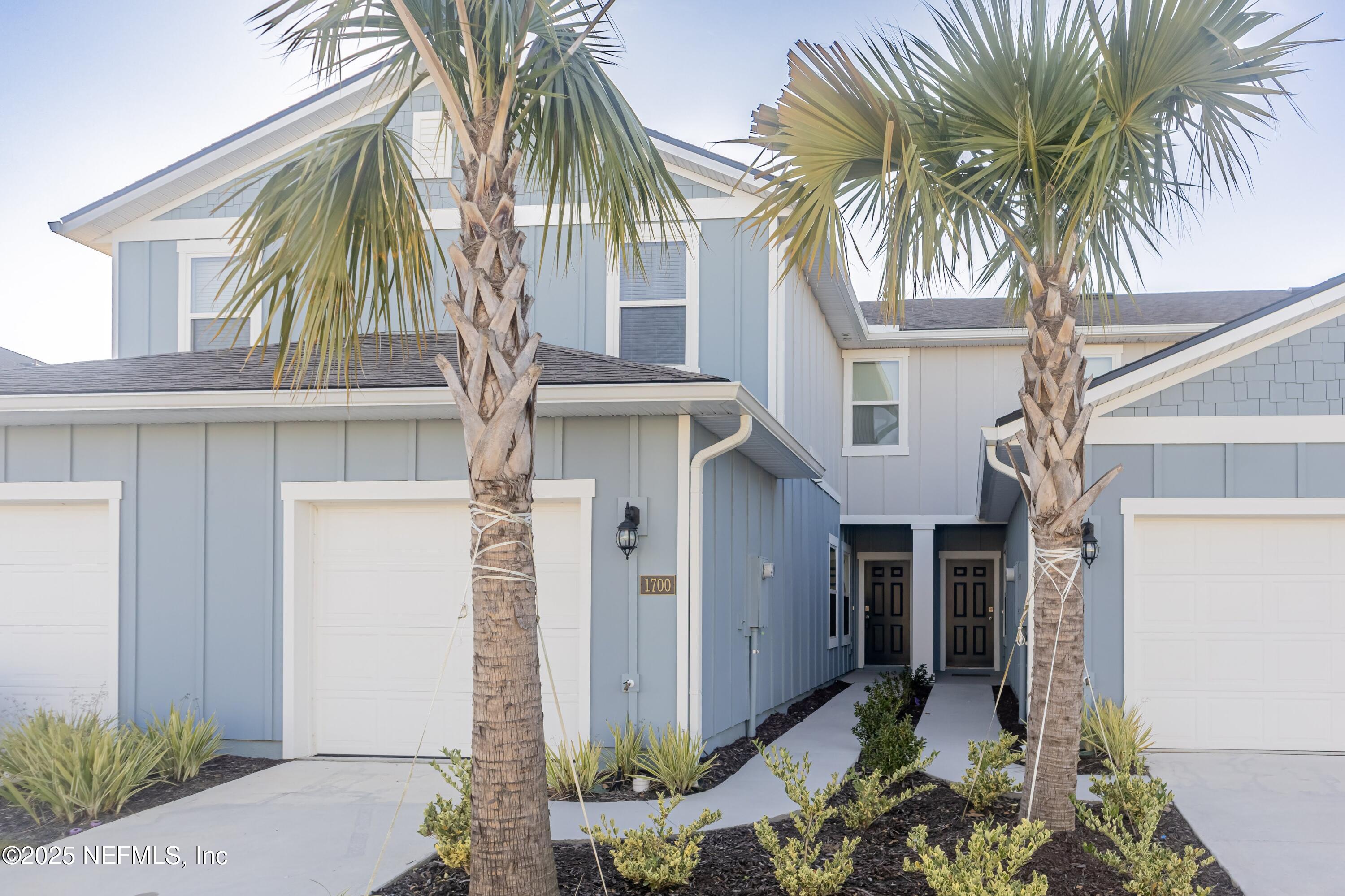 1700 Bridger Trace Middleburg, FL 32068 - Photo 13 of 14 a front view of house with small garden