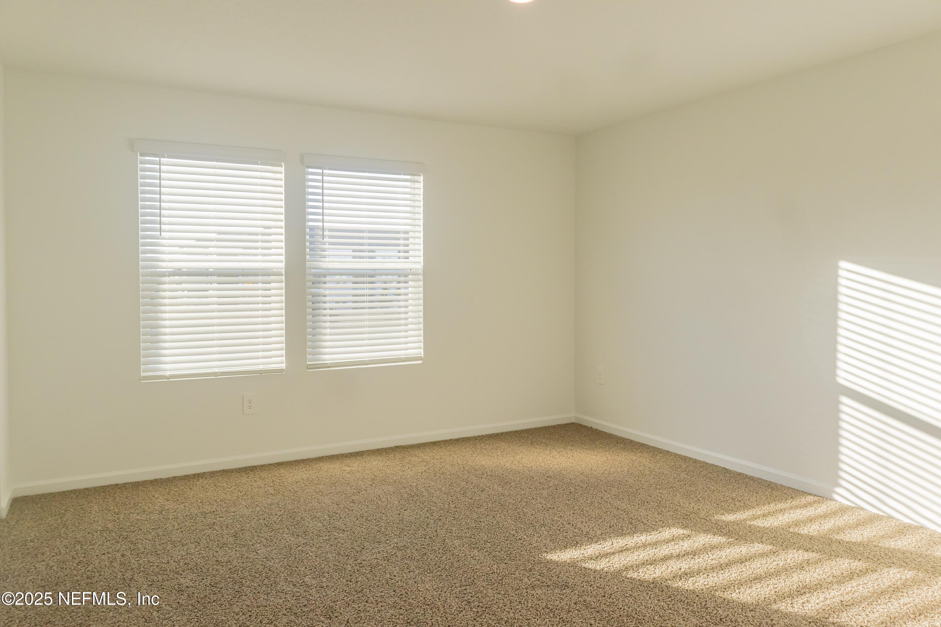 1700 Bridger Trace Middleburg, FL 32068 - Photo 9 of 14 an empty room with a window