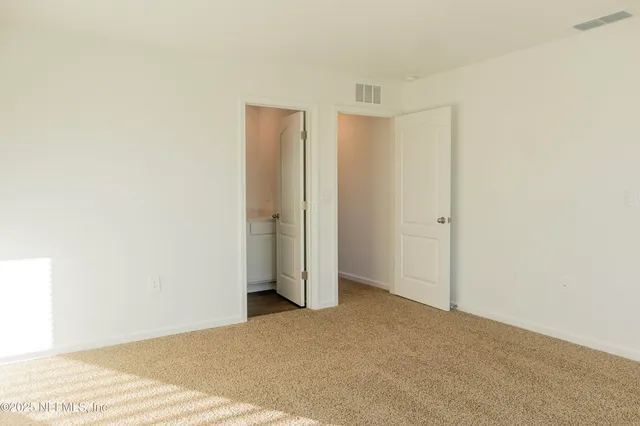 a bathroom with a sink a toilet and bathtub