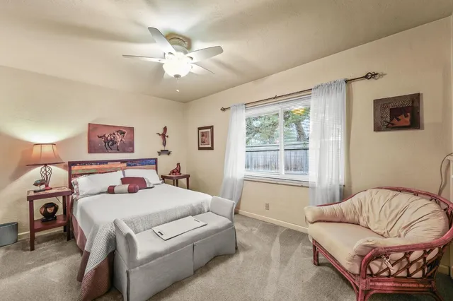 a bathroom with a shower and a toilet