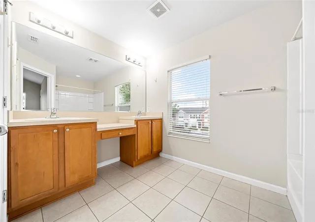 a view of a kitchen with a sink