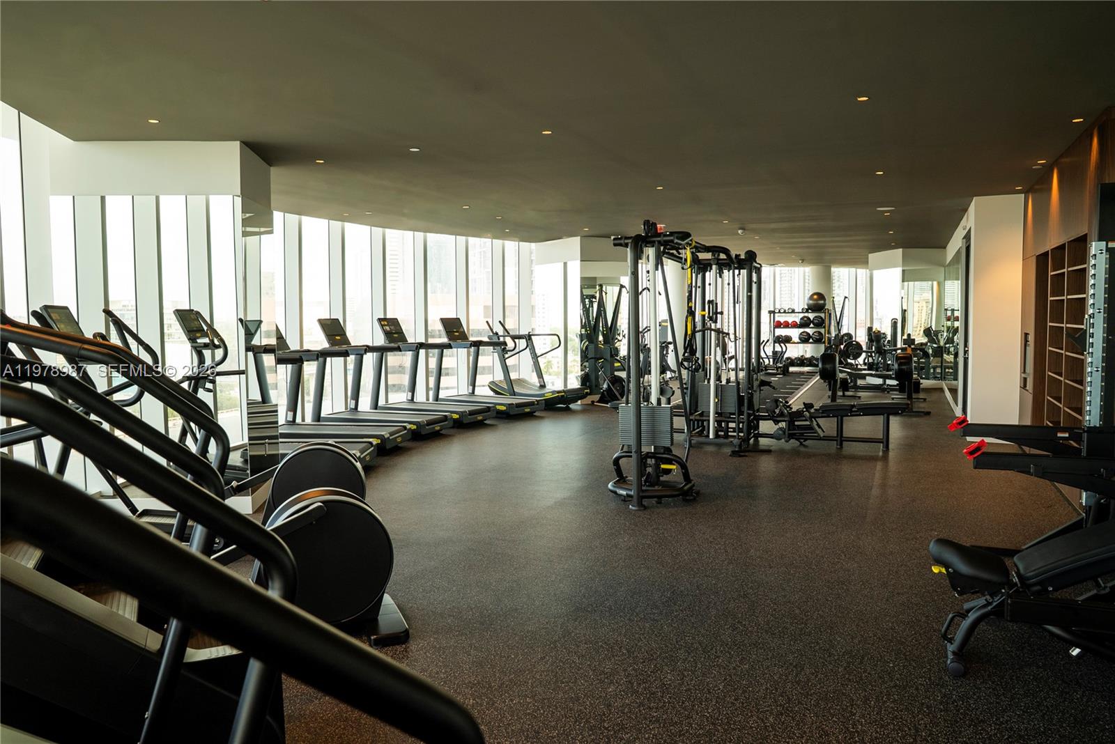 275 Southwest 6th Street, Unit 2007 Miami, FL 33130 - Photo 14 of 24 a view of a room with gym equipment