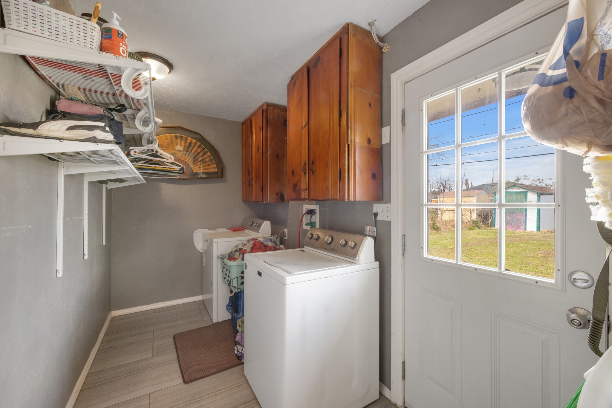 8901 Woodlyn Road Houston, TX 77078 - Photo 20 of 22 a utility room with dryer and washer