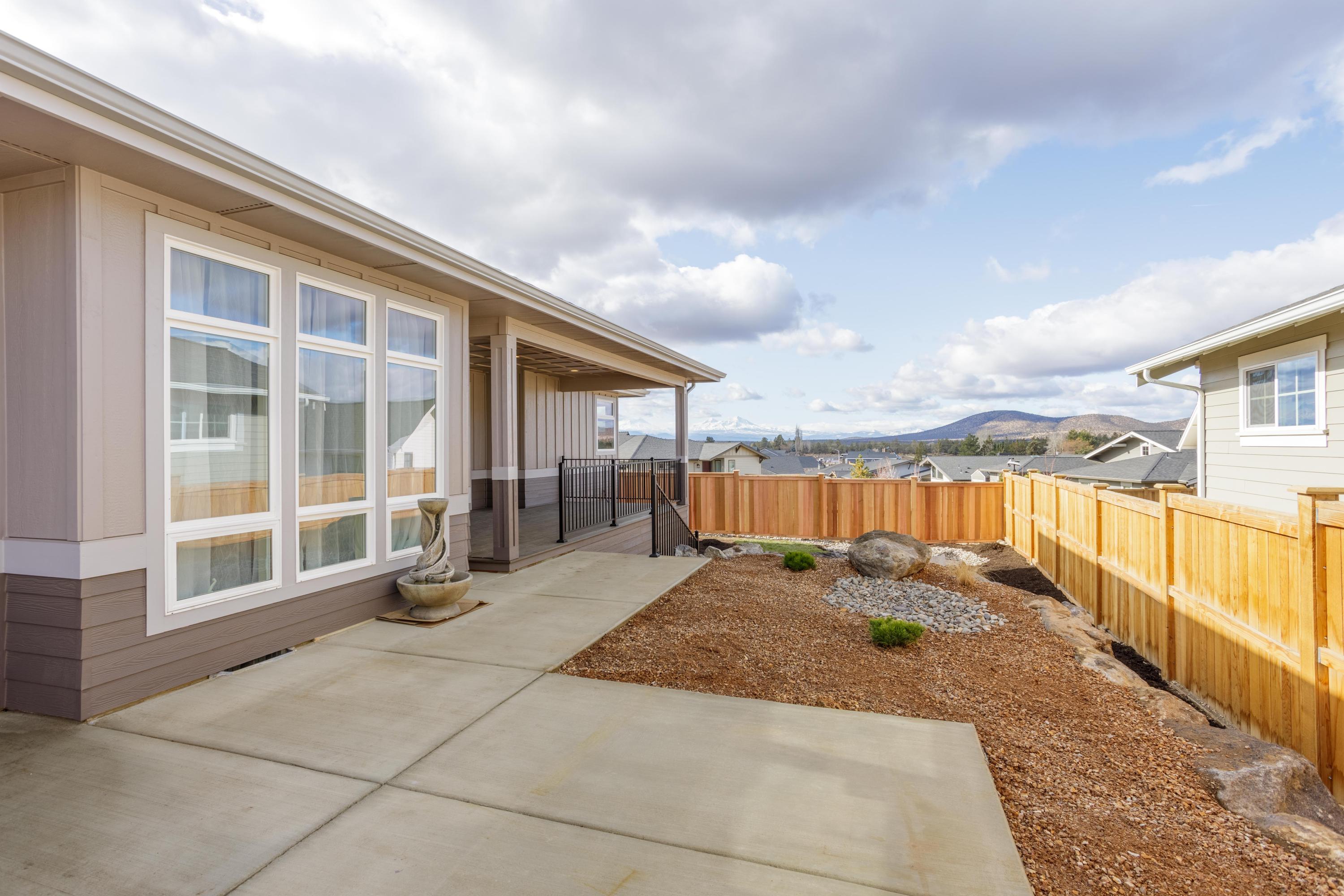 3679 Southwest 45th Street Redmond, OR 97756 - Photo 28 of 41 Side yard with massive RV pad and Cascade mountain views