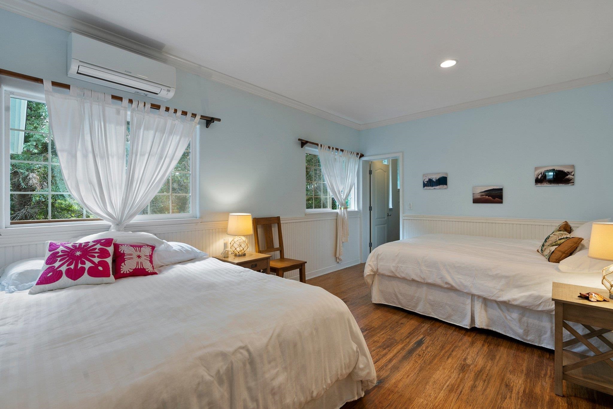 370 Waiama Way Haiku, HI 96708 - Photo 13 of 24 a bedroom with bed and a large window